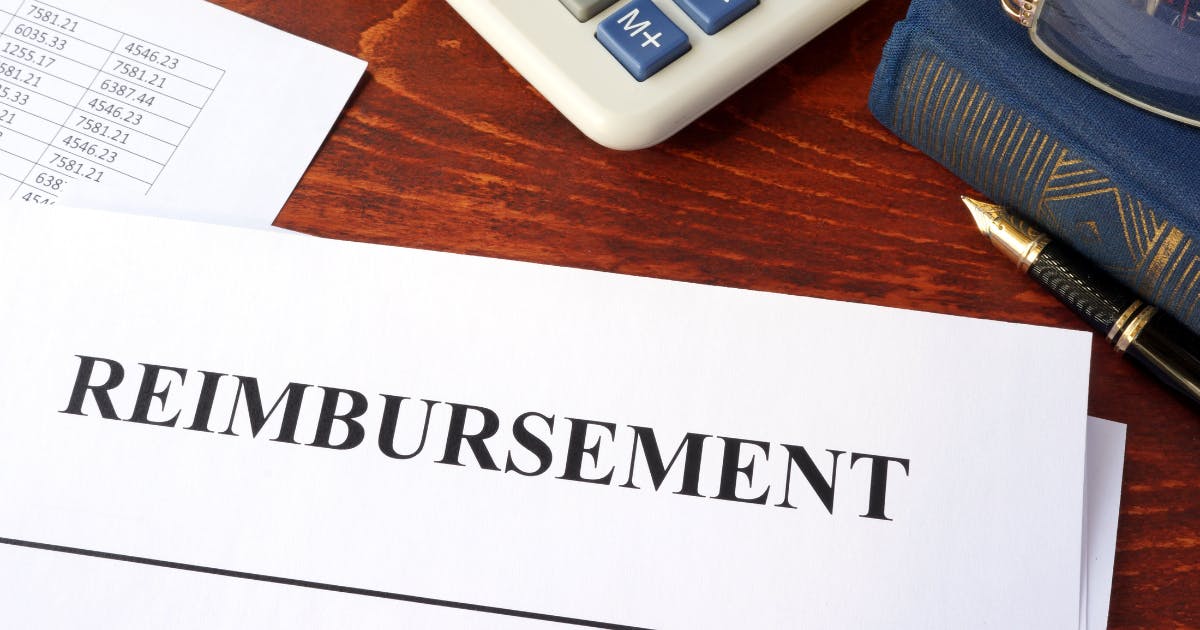 Close-up of a printed reimbursement request, illustrating how to track and process employee reimbursements in small business accounting.