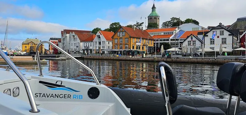 A RIB boat in the front with Stavanger City in the background