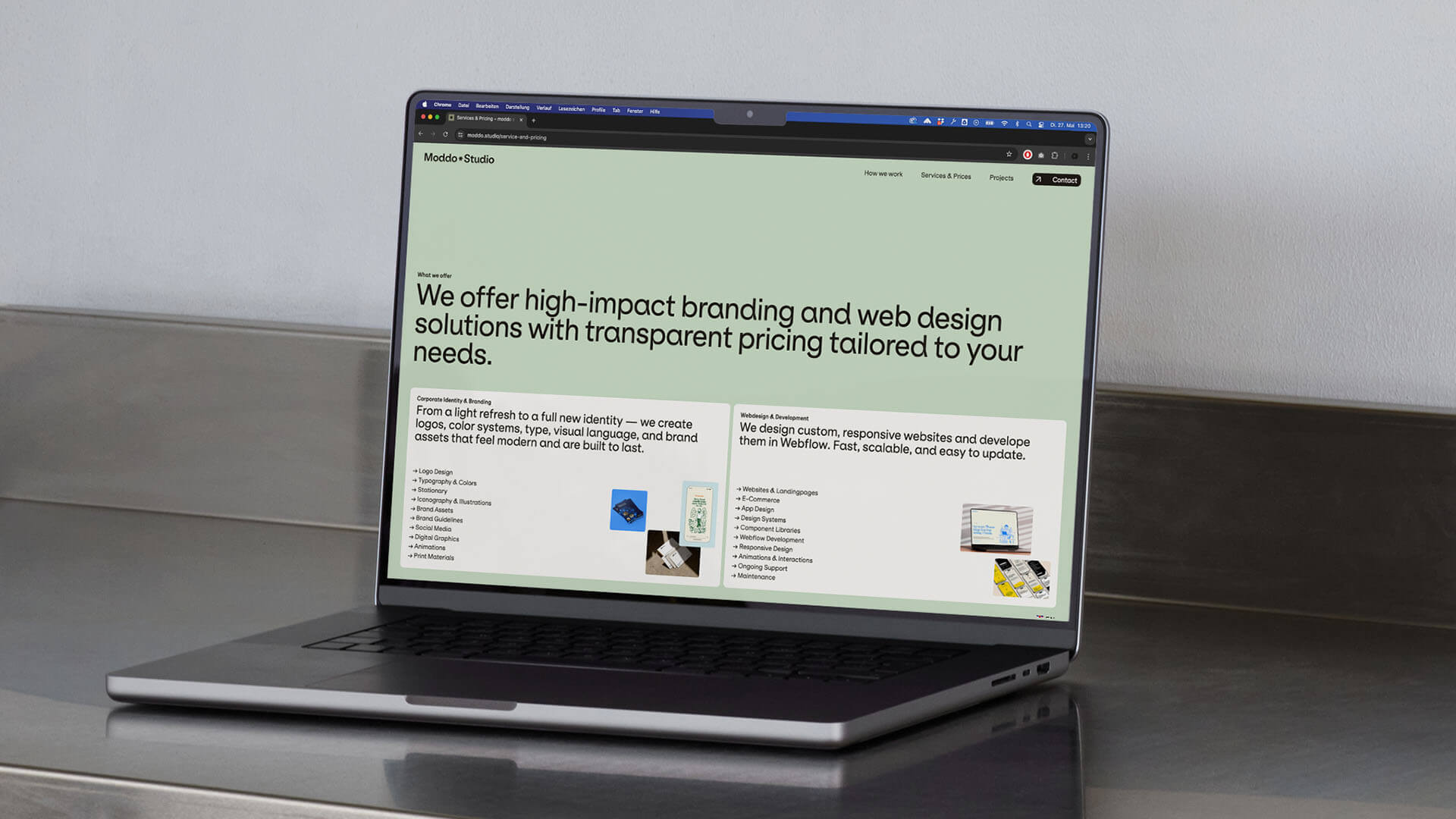 A laptop showing the website of the client.