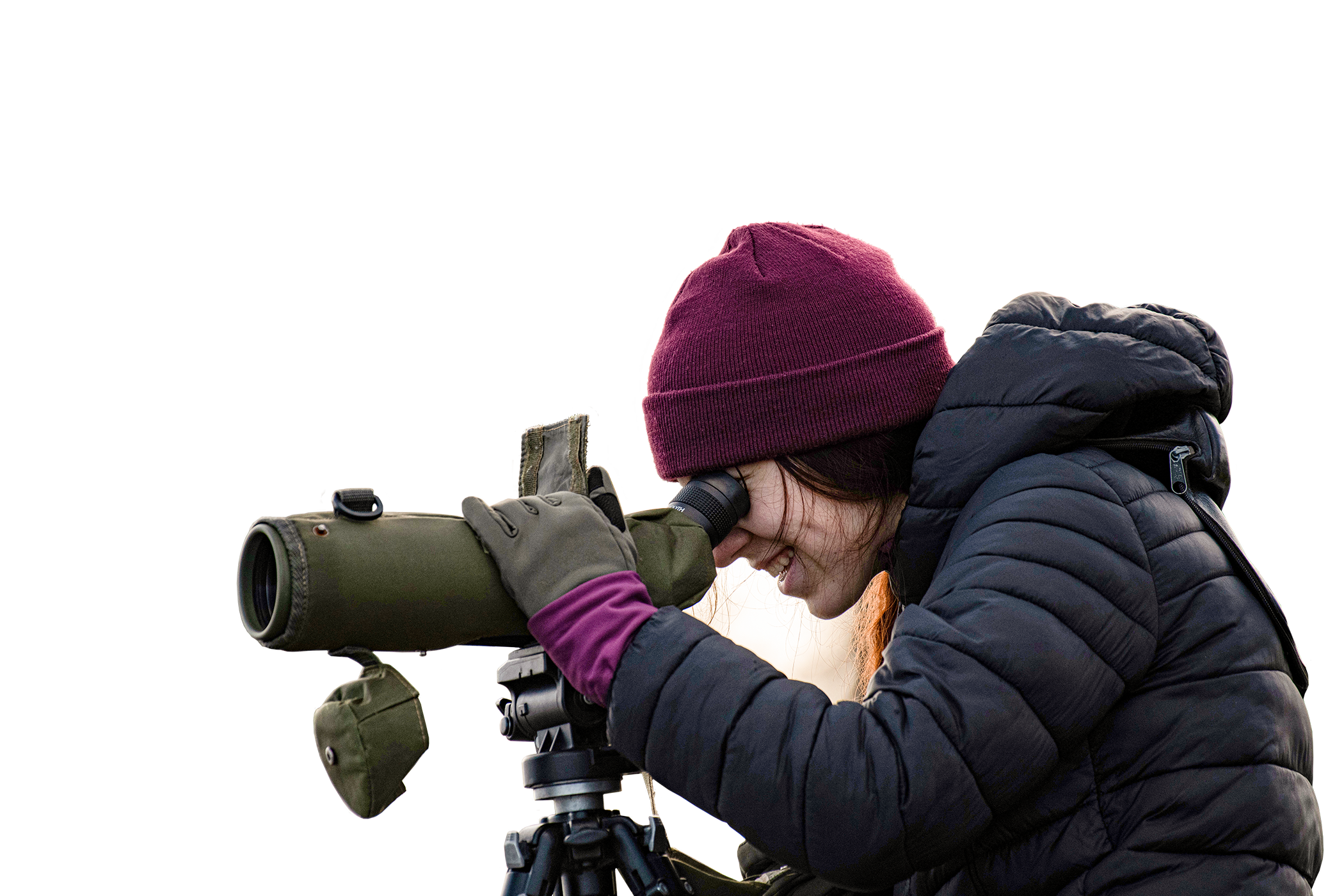 Un membre du groupe des jeunes en observation avec une longue vue.