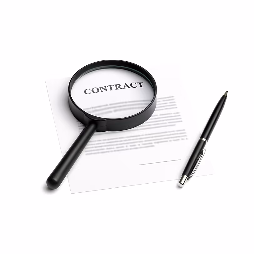 Contract with magnifying glass and pen symbolizing transparent yacht charter pricing.
