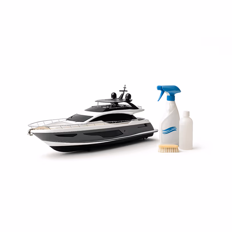 Modern yacht model with cleaning products symbolizing recent and well-maintained yachts.