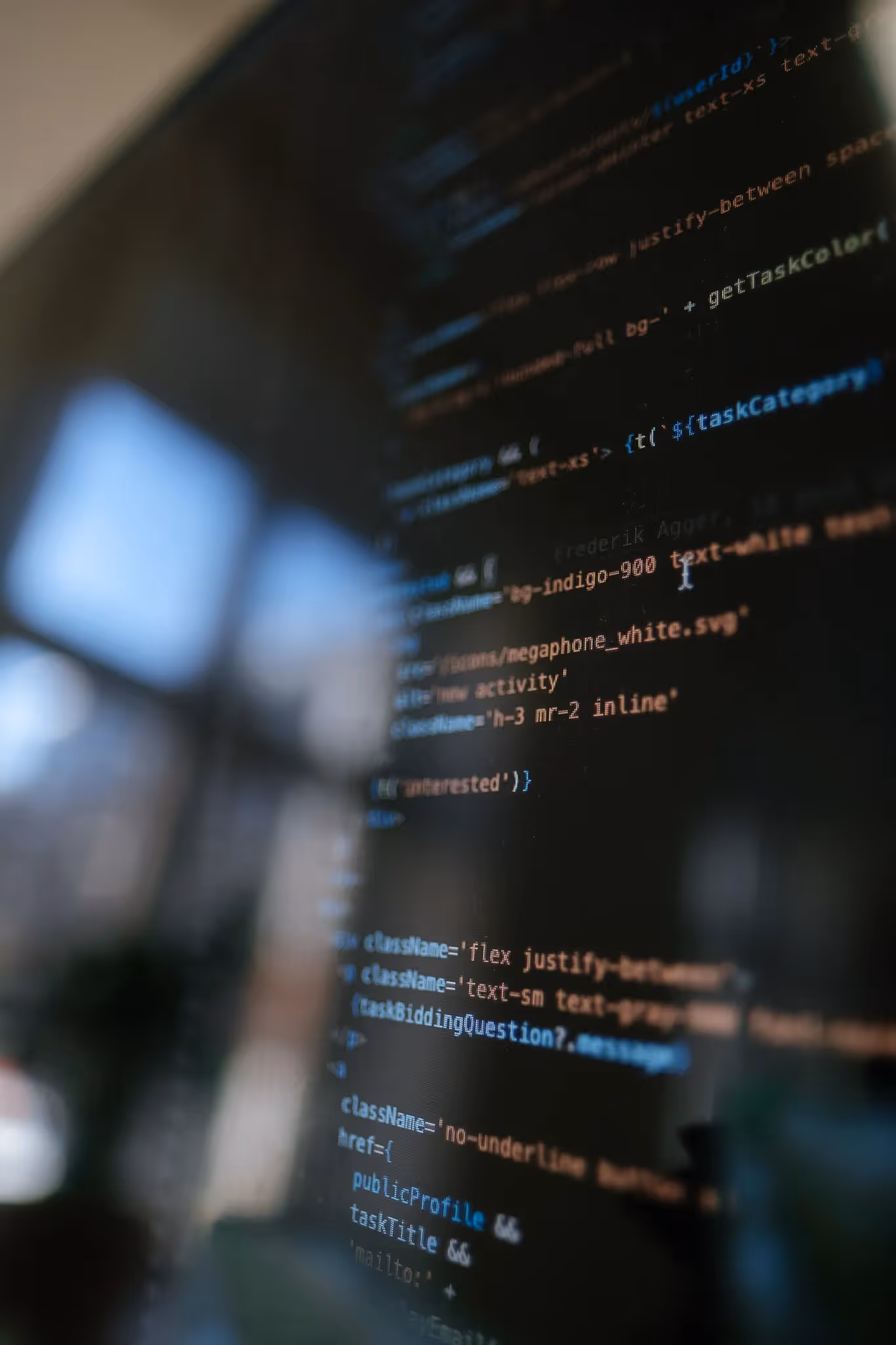 Close up on computer screen with lines of code
