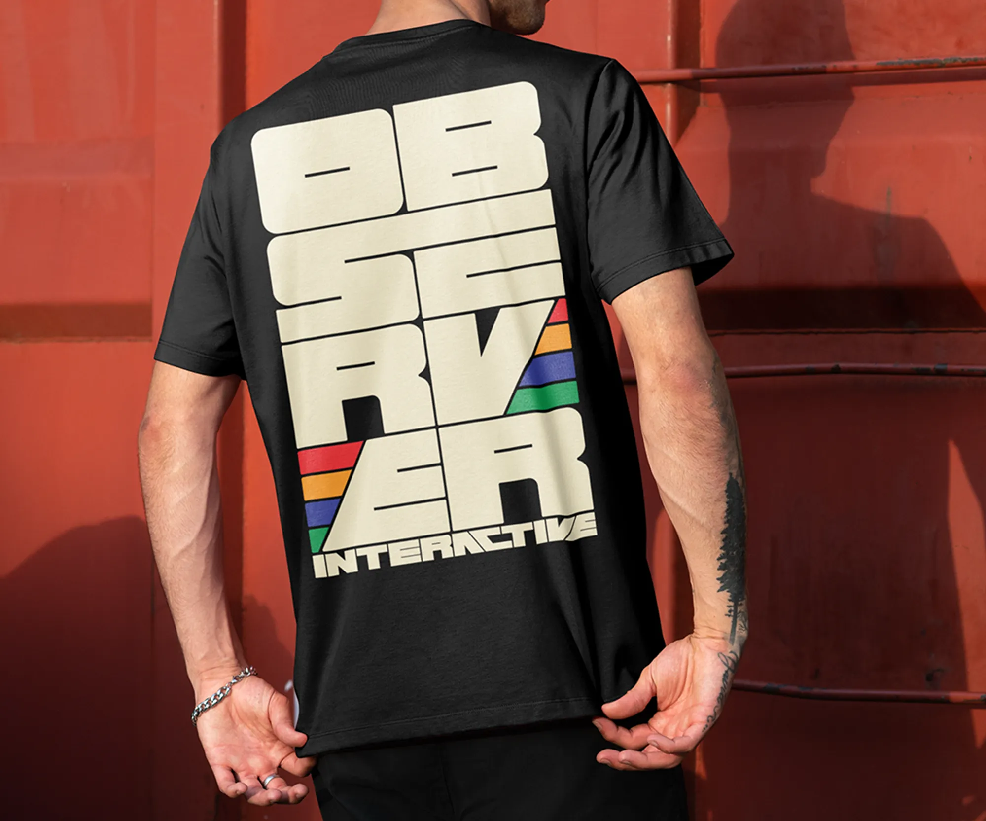 Mockup of vertical Observer Interactive Logo on shirt