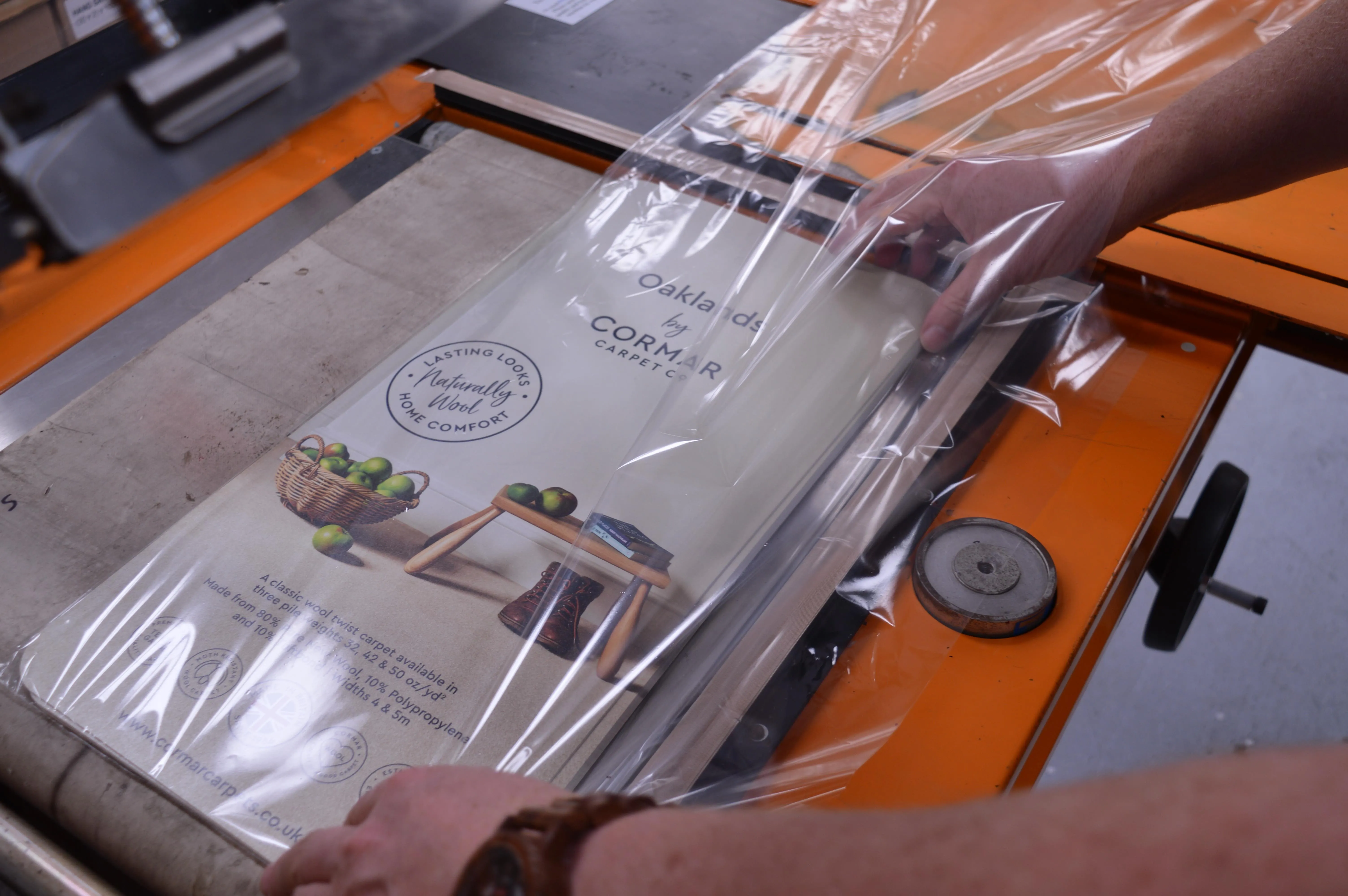 a mans hand typing on a laptop