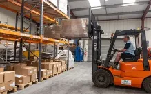 a person operating a fork lift