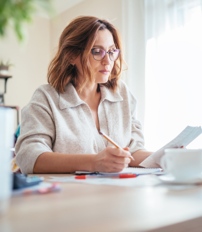 Woman reviewing journal entries