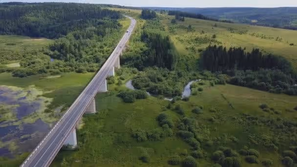 Image of a road and brdge overwetlands