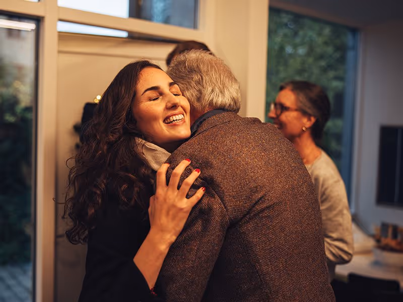lady hugging father