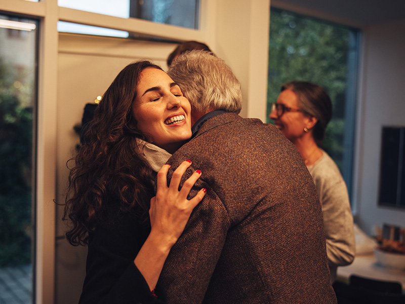 lady hugging father