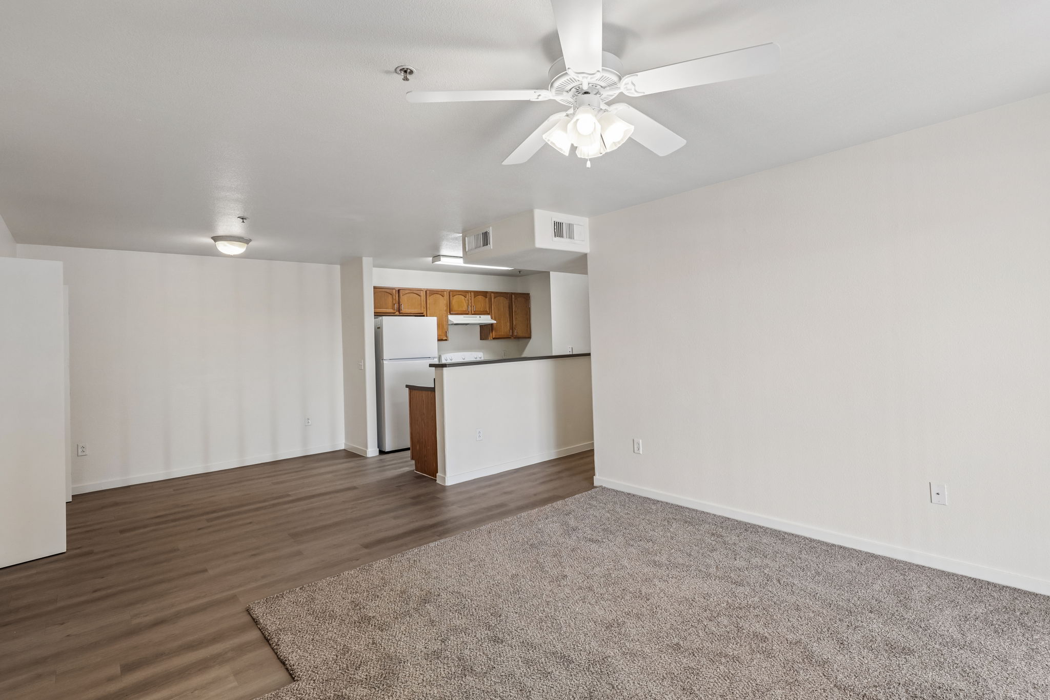Dining area with view of kitchen and living area