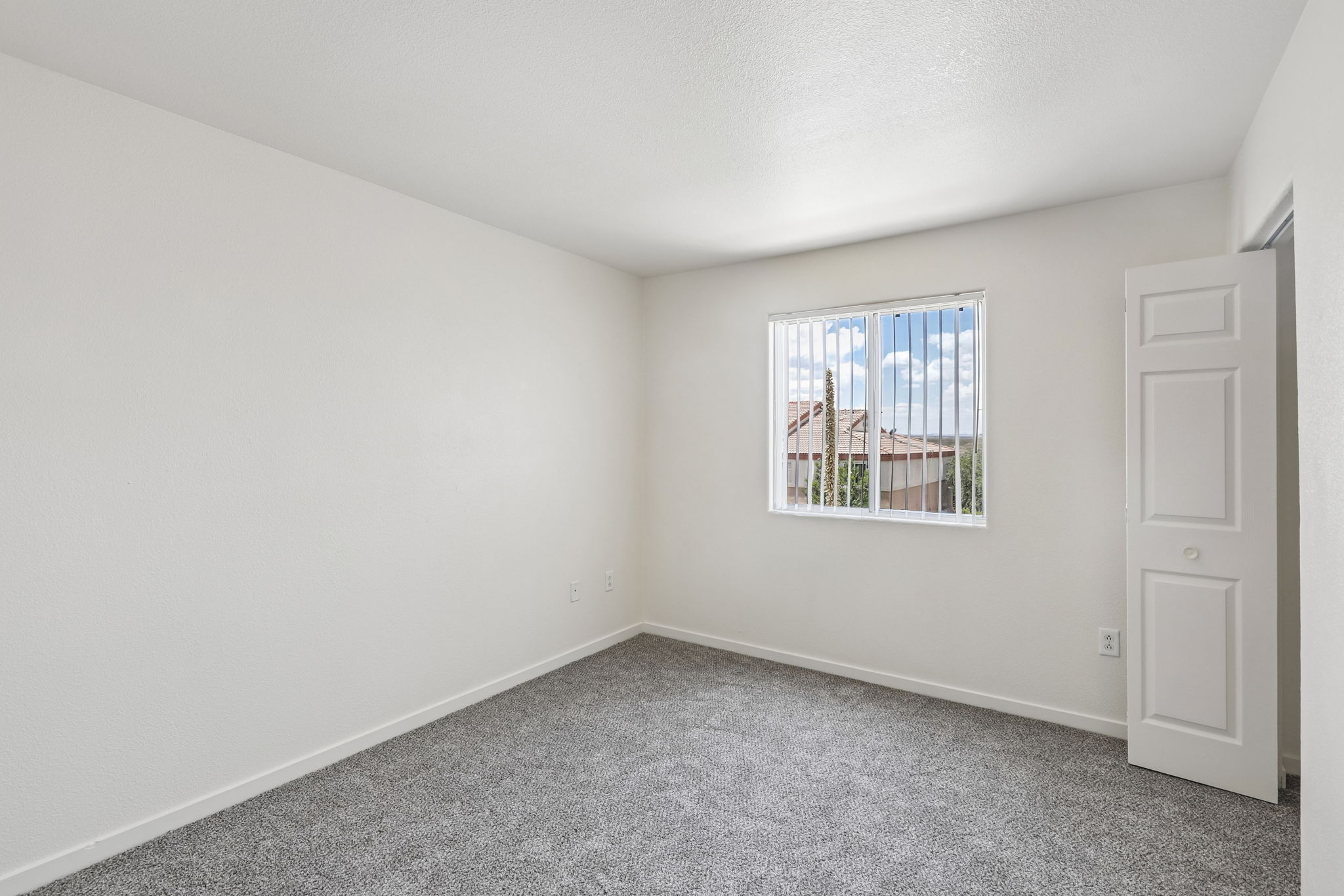 Unfinished bedroom with window