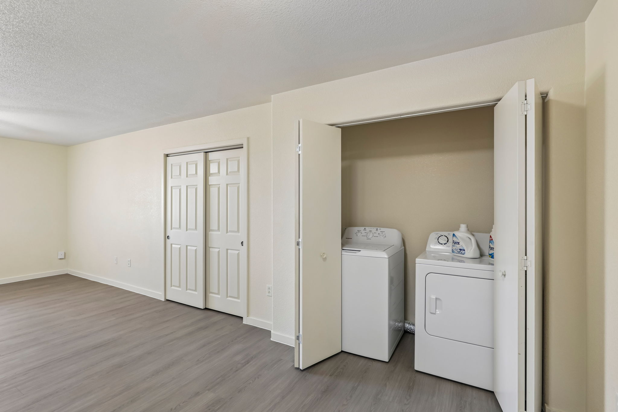 laundry closet with washer and dryer