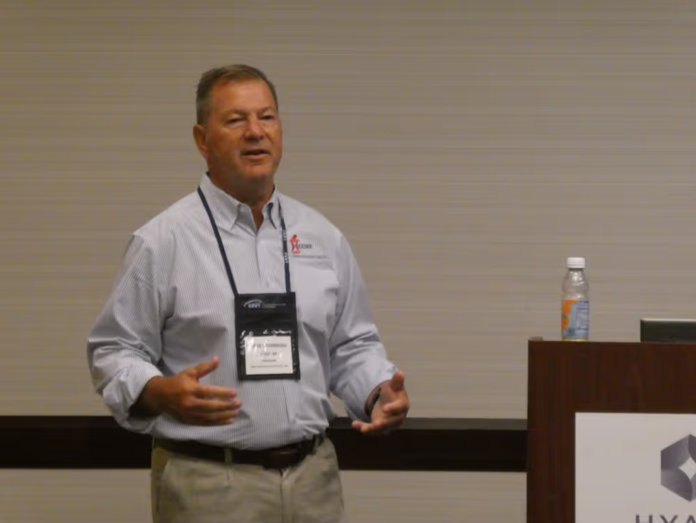 Man giving a presentation at the CERT 2024 River City Roundtable Conference