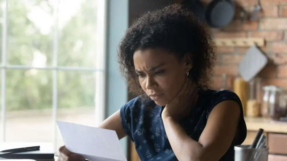 Woman Reading Document 
