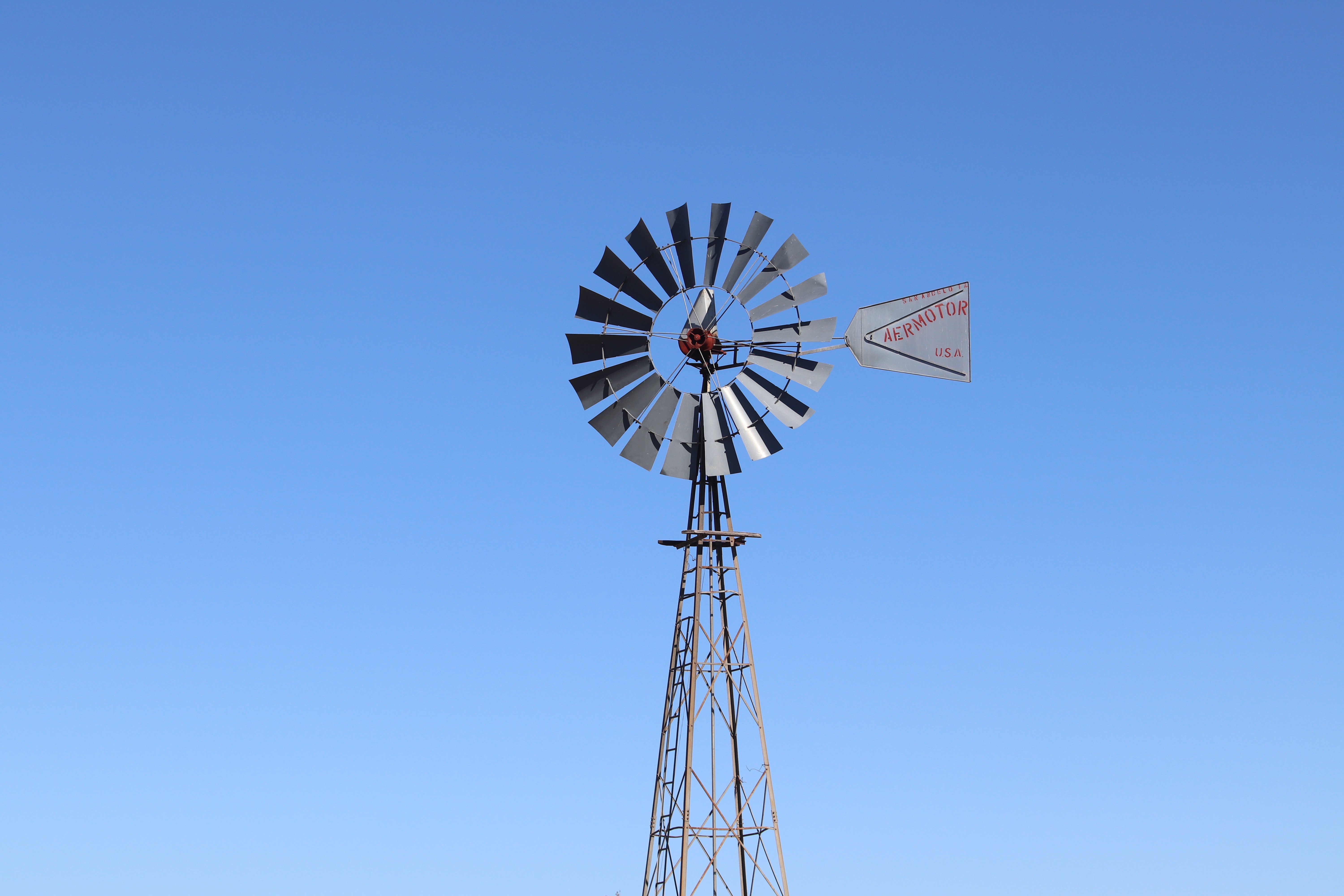 Classic Aermotor windmill used for pumping water on a ranch.