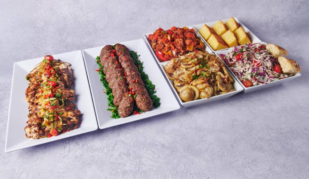 Middle Eastern buffet with chicken shawarma and beef kofta