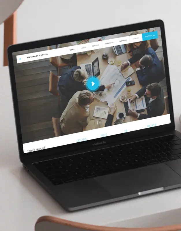 Firstborn Capital website displayed on a laptop, showcasing a professional financial services interface with strong imagery, clear navigation, and a polished corporate digital identity.