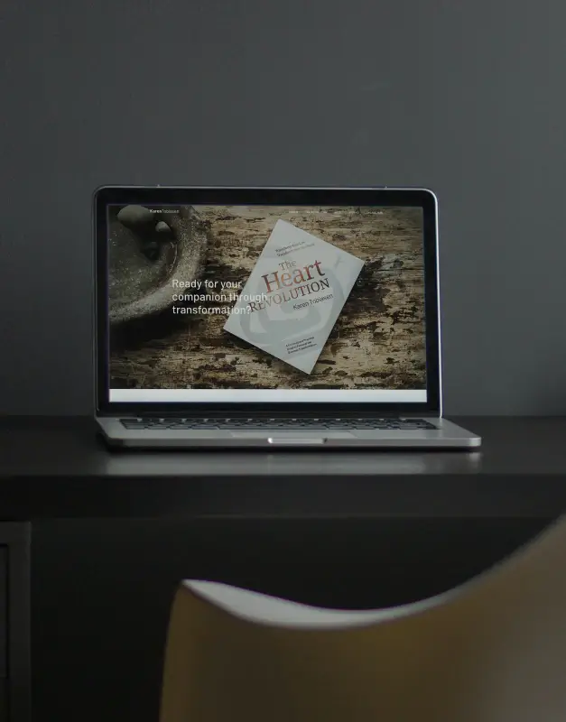 Karen Tobiasen website shown on a laptop with a book-led homepage, presenting a calm editorial design and a thoughtful digital experience centred around authorship and storytelling.