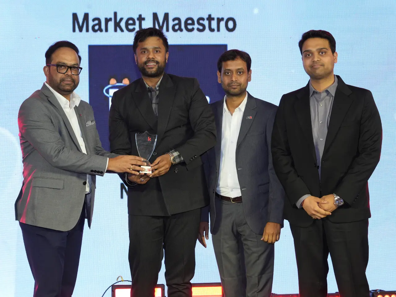 Indoor Innovations team receiving the Market Maestro award