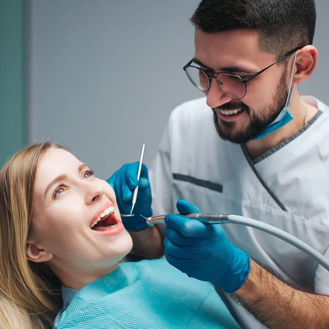 Dentist consulting with a patient about dental implants