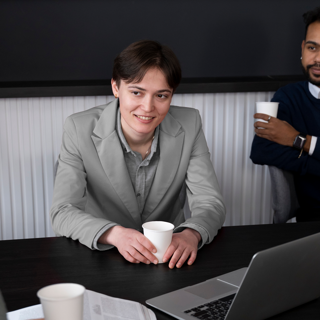  Insurance agent reviewing commercial policy documents with a small business owner