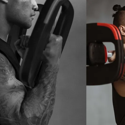 Les Mills Instructor holding a SmartBar and SmartBar Plate
