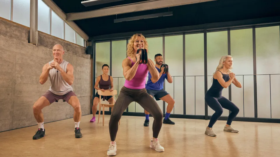 A group of people doing low impact exercises