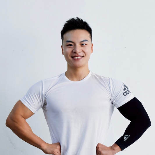 Image of Nick Yan smiling facing forwards towards the camera