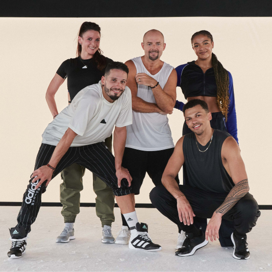 A group of instructors smiling at the camera having just completed a BodyJam workout