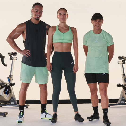 A group of instructors smiling at the camera having just completed a Les Mills Sprint workout