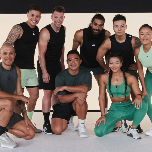 A group of instructors smiling at the camera having just completed a Les Mills Core workout