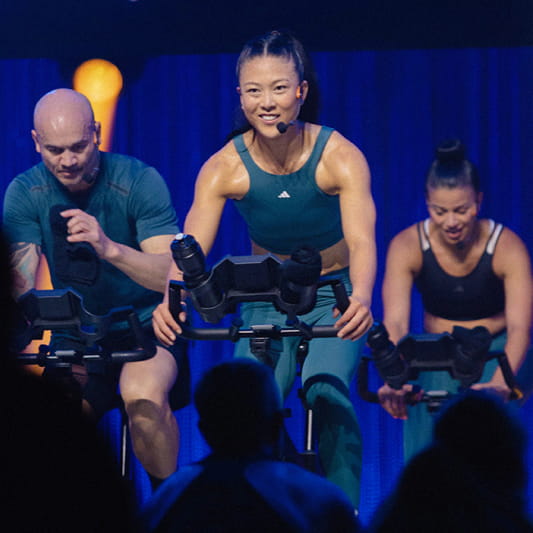 A group of Instructors demonstrating a Les Mills Sprint workout