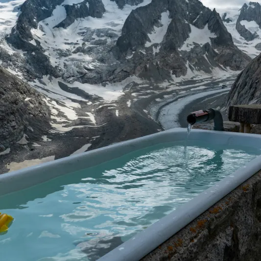 Bath in foreground and mountain range in background