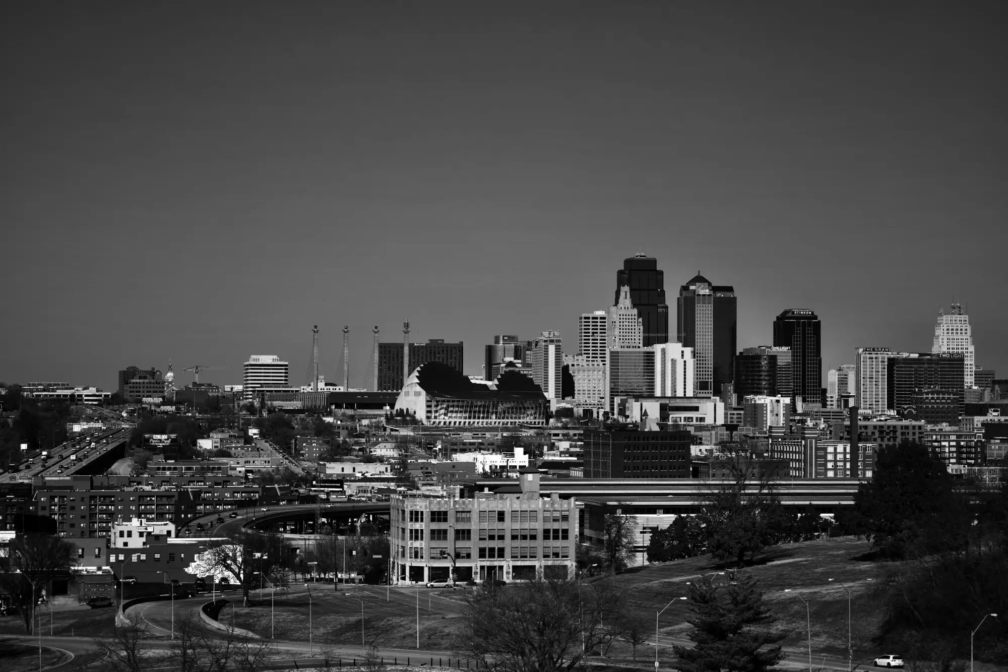 Panoramic view of the Kansas City, Missouri skyline, featuring a mix of modern skyscrapers and historic buildings