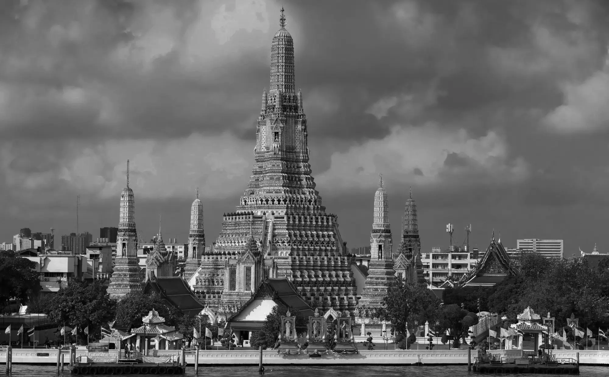 Wat Arun temple in Bangkok, Thailand, with its ornate prangs and colorful porcelain details