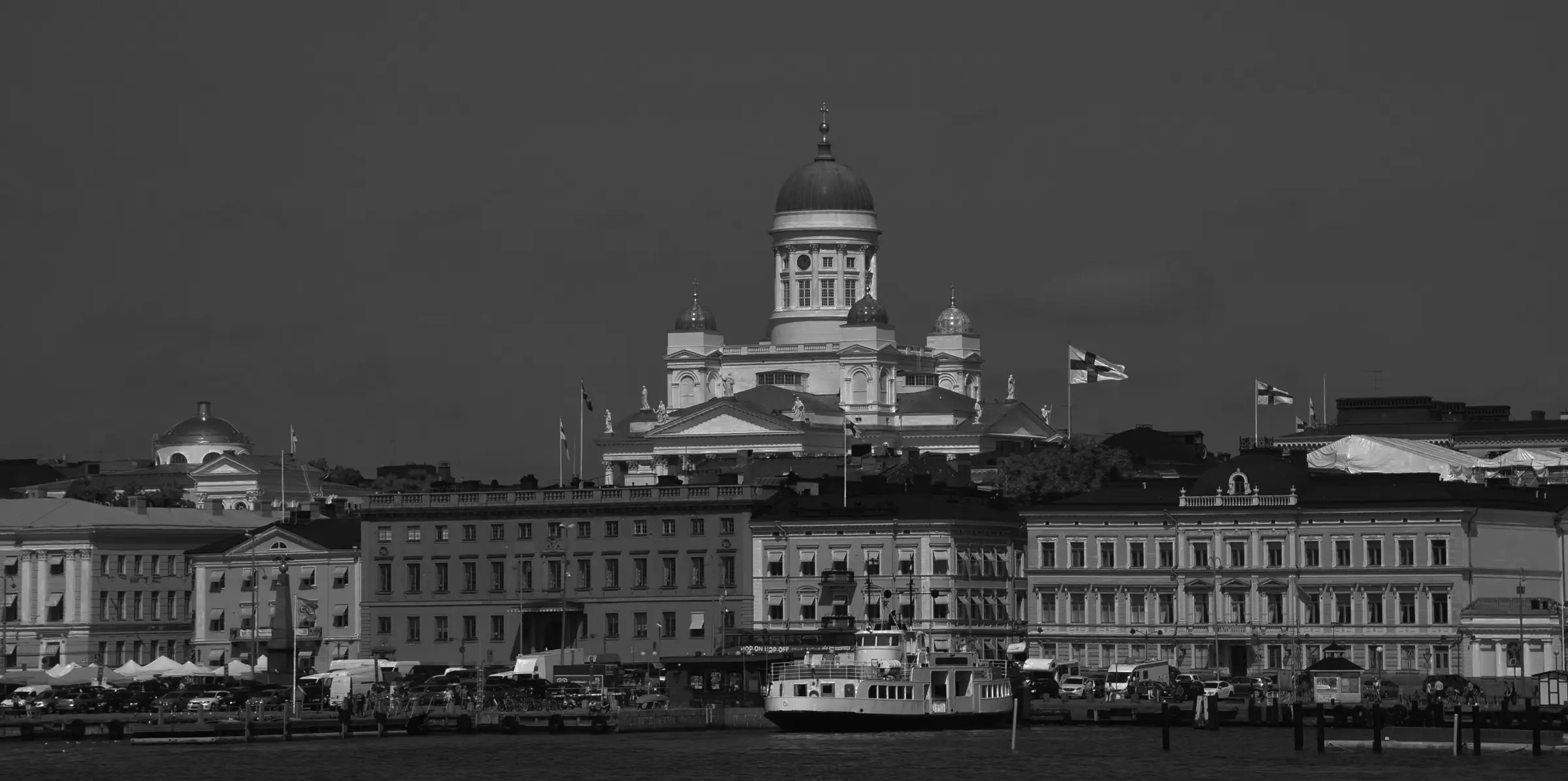 Waterfront view of Helsinki featuring the domed Helsinki Cathedral
