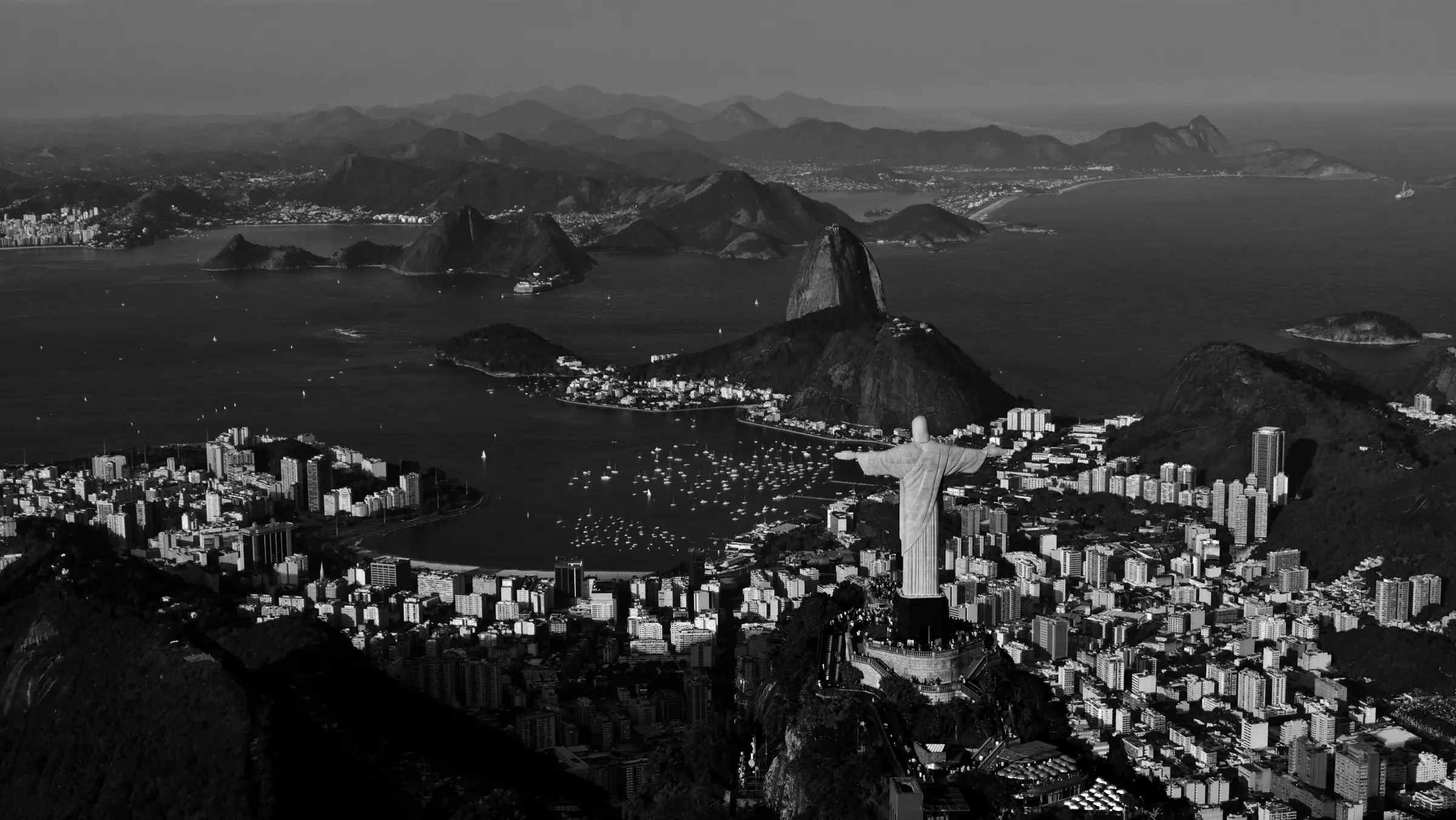Aerial view of Rio de Janeiro featuring Christ the Redeemer, Sugarloaf Mountain, and Guanabara Bay