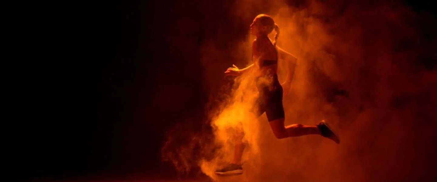 a dramatic shot f a person sprinting