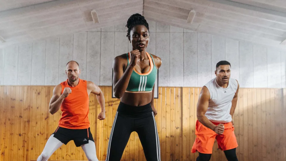 three people in dynamic poses