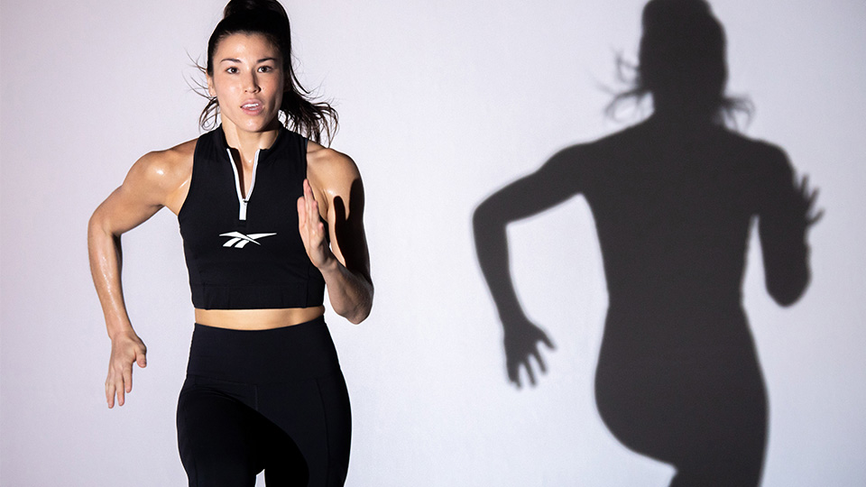 a woman mid-motion running