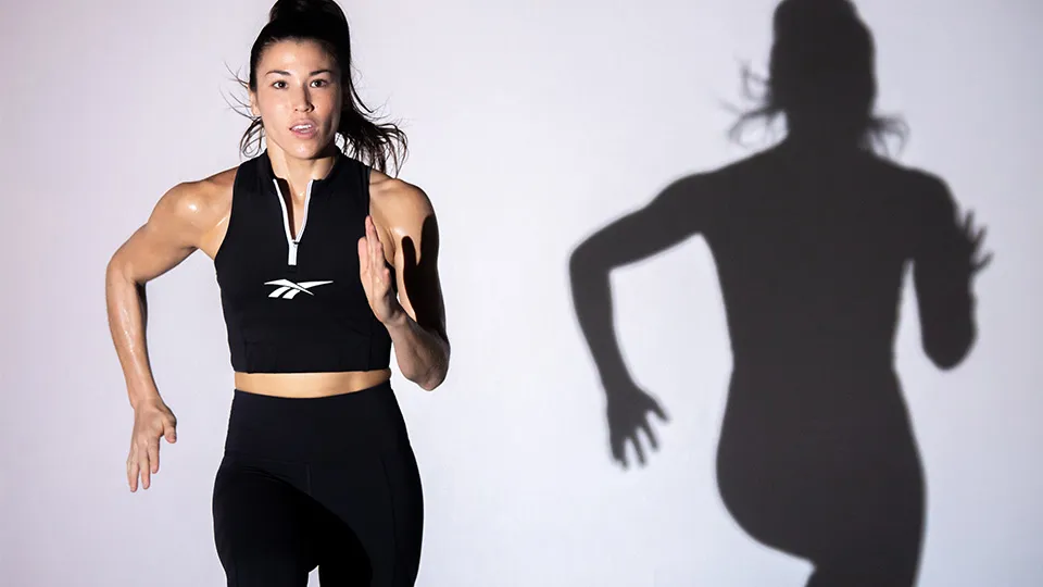 a woman mid-motion running