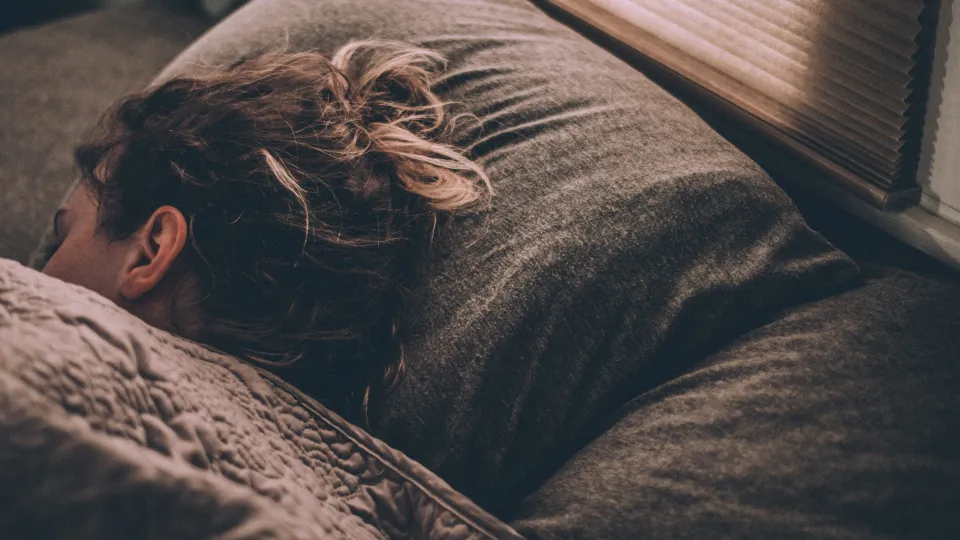 a person sleeping in bed