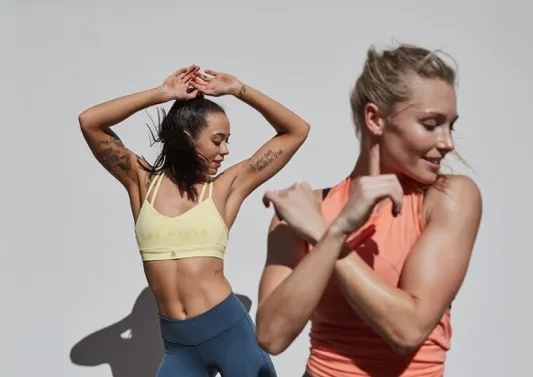 two ladies mid-motion