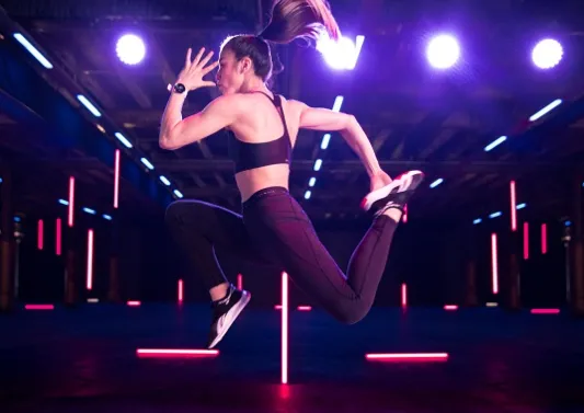 a woman mid-motion high jump