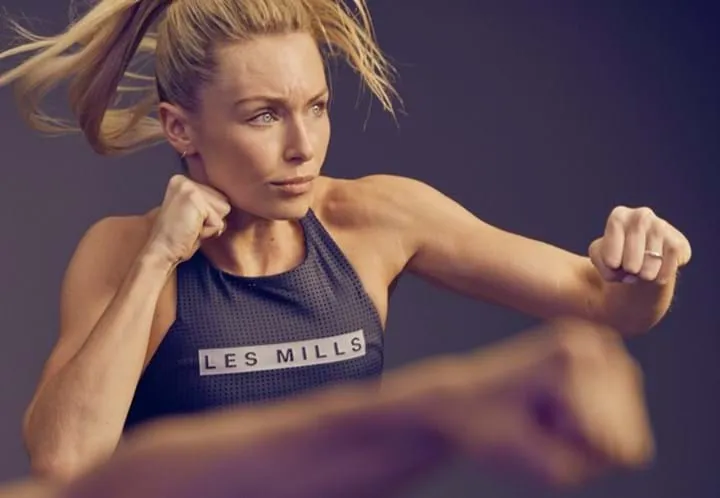 woman in a dynamic mid-punch pose
