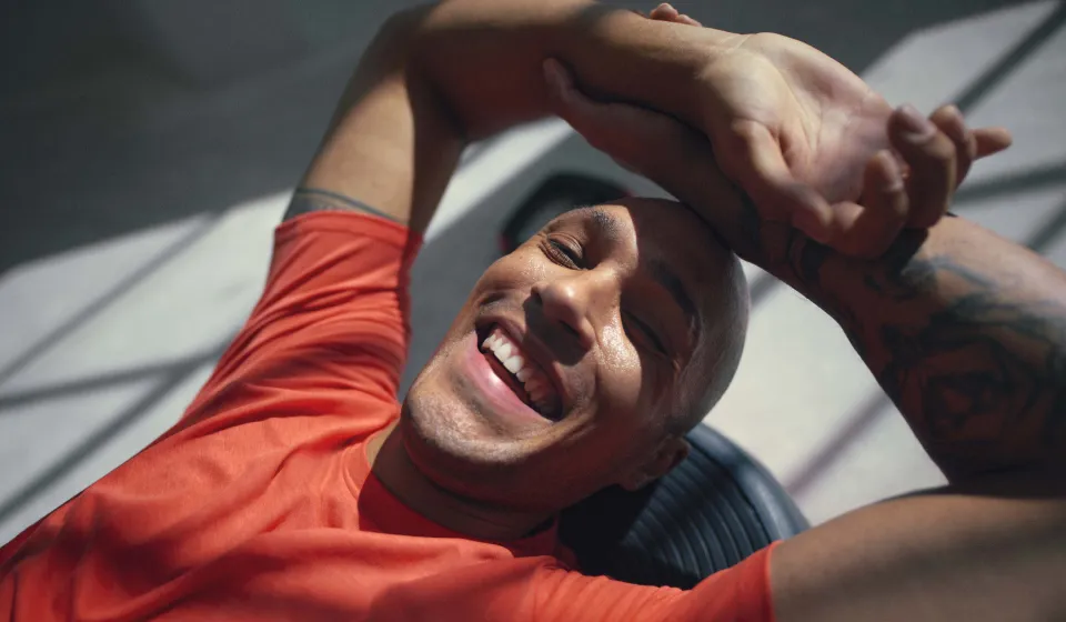 Man happy after completing a workout