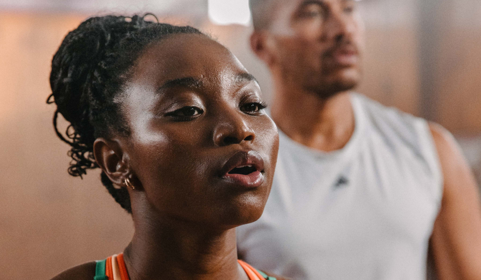 A man and women in training gear