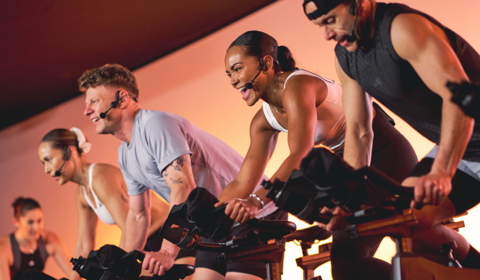 A group of instructors in a cycle class