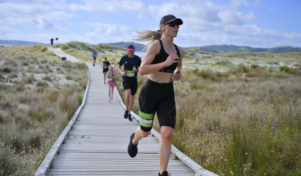 Erin Maw running outdoors in a marathon